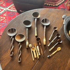 Bunch of African kitchen wood spoons plus other wood pieces. African home decor